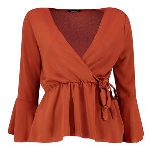 Boohoo wrap front rust peplum blouse